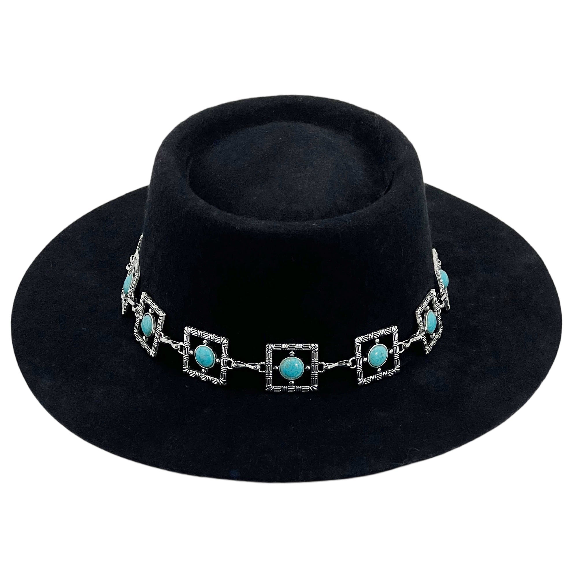 Black Frame – Teal Glyph